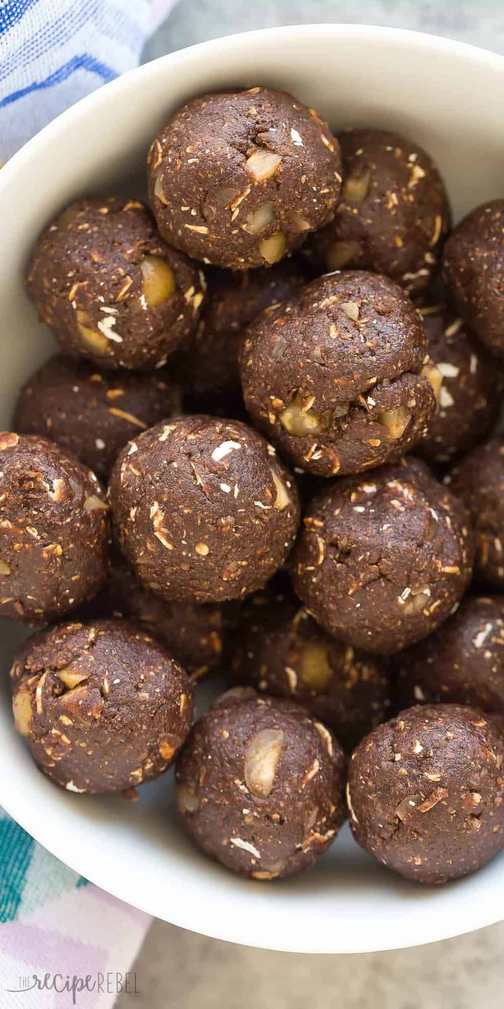 long overhead image of chocolate hazelnut energy bites in white bowl