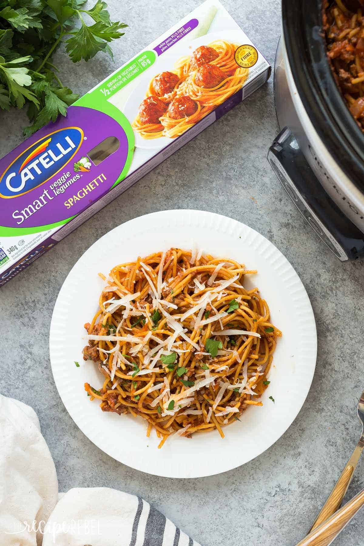 overhead image of white plate of spaghetti and meat sauce with catelli smart veggie spaghetti