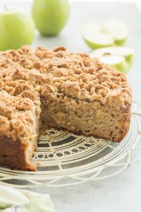 This Apple Coffee Cake with Crumb Topping is the perfect fall breakfast or dessert -- Greek yogurt makes it so moist and it's loaded with apples and the best crunchy brown sugar streusel! | apple cake | baking | fall baking | fall recipe | breakfast | brunch | Greek yogurt cake | apples | Thanksgiving | Christmas
