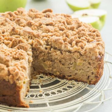 This Apple Coffee Cake with Crumb Topping is the perfect fall breakfast or dessert -- Greek yogurt makes it so moist and it's loaded with apples and the best crunchy brown sugar streusel! | apple cake | baking | fall baking | fall recipe | breakfast | brunch | Greek yogurt cake | apples | Thanksgiving | Christmas