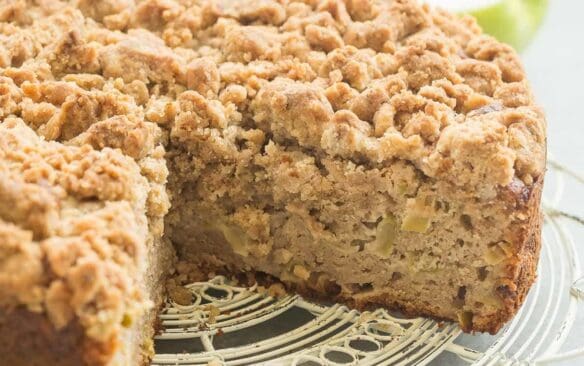 This Apple Coffee Cake with Crumb Topping is the perfect fall breakfast or dessert -- Greek yogurt makes it so moist and it's loaded with apples and the best crunchy brown sugar streusel! | apple cake | baking | fall baking | fall recipe | breakfast | brunch | Greek yogurt cake | apples | Thanksgiving | Christmas