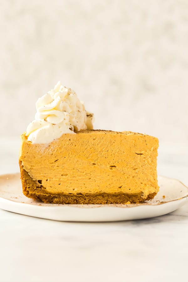 no bake pumpkin cheesecake slice on white plate