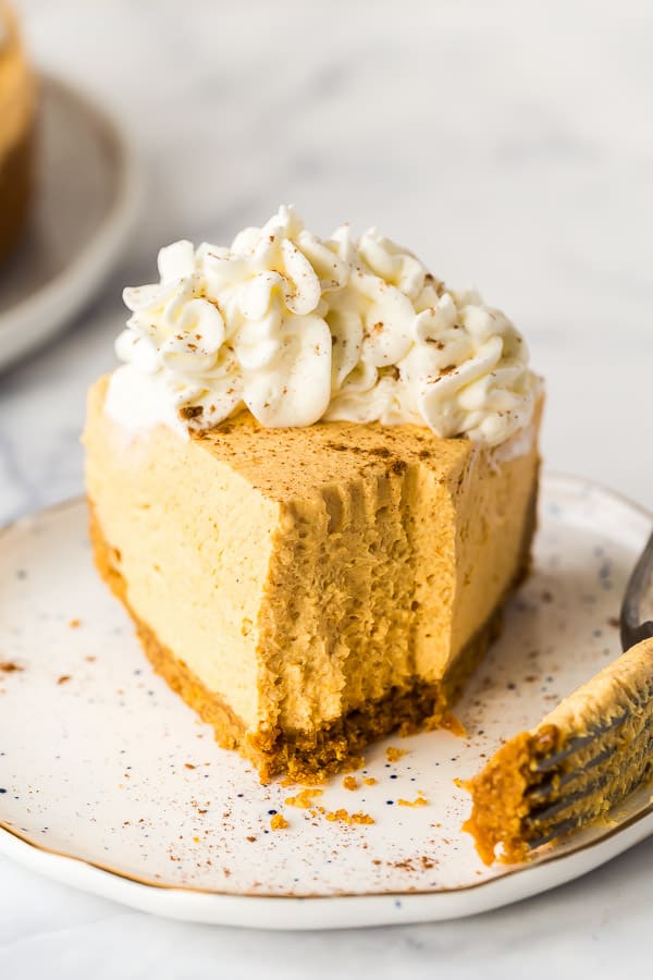 no bake pumpkin cheesecake slice with bite missing