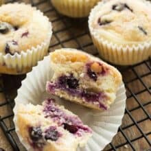 These Blueberry Lemon Muffins with Cream Cheese Swirl are a little sweet, a little tangy and perfect for breakfast or snack! Easy to make ahead and freezer friendly. Includes step by step recipe video. | lemon recipe | lemon bread | berries | yogurt muffins | breakfast | brunch | cream cheese muffins