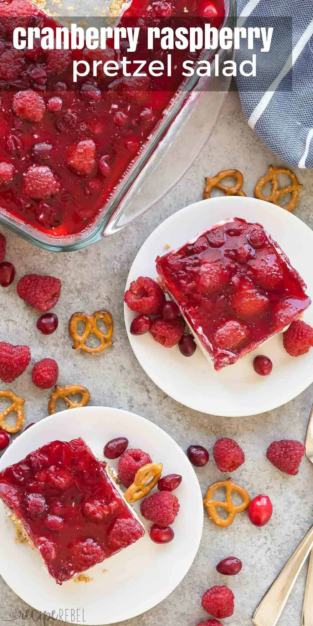 long overhead image of cranberry raspberry pretzel salad with one piece on white plate