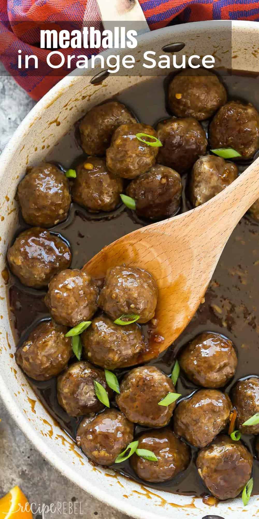 These Easy Meatballs in Orange Sauce have just a few ingredients and are perfect for a quick dinner, freezer meal, or even a holiday dinner or appetizer! Perfect over rice or with mashed potatoes. Includes step by step recipe video. long overhead image of orange meatballs in large skillet with wooden spoon