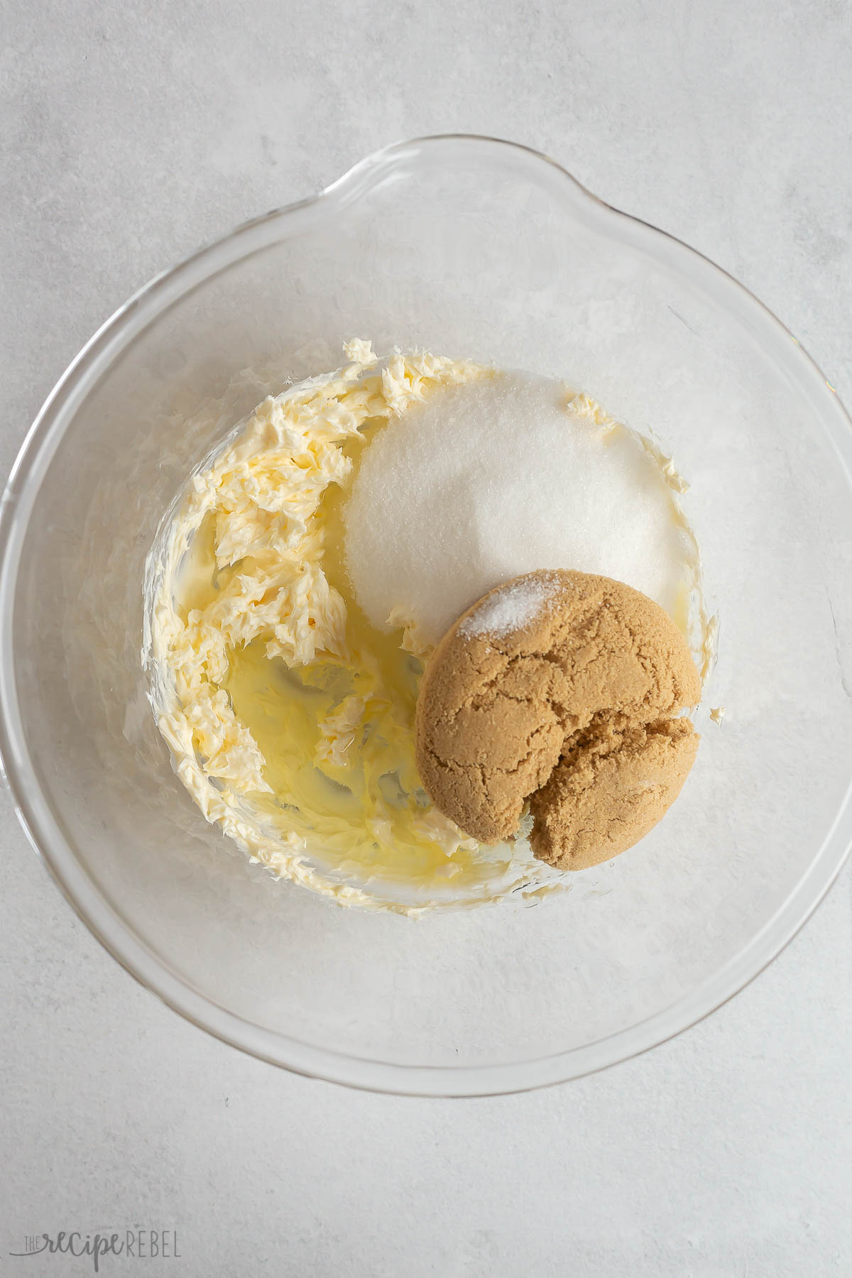 butter and sugars in glass bowl