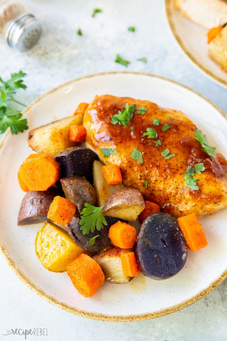 apricot chicken sheet pan dinner on plate with chicken breast and potatoes