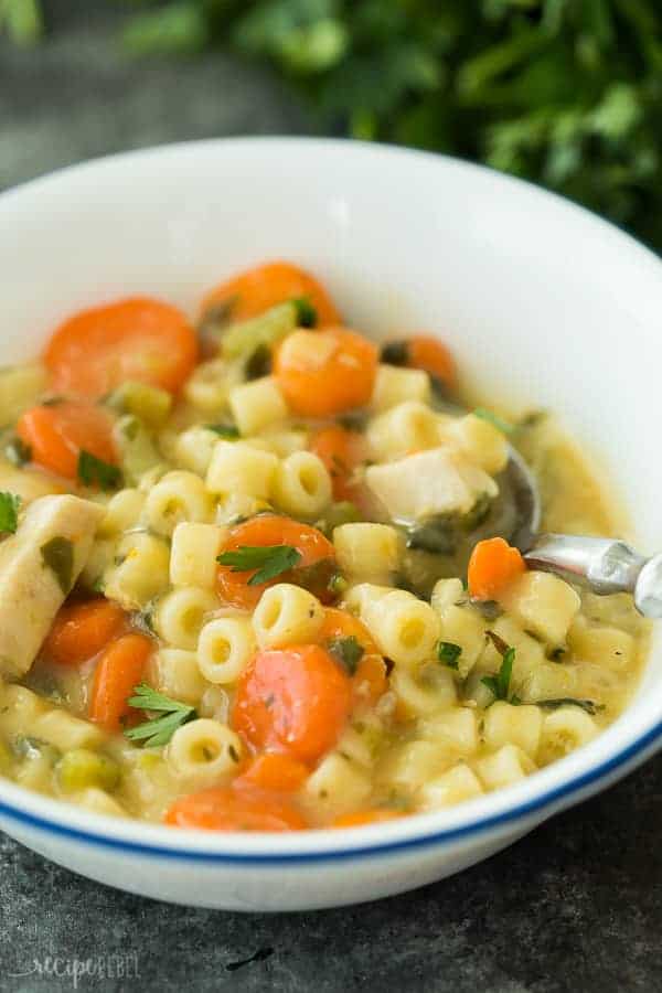This Creamy Instant Pot Chicken Noodle Soup Recipe is a healthy dinner recipe that's easy enough for any day of the week! It's made in the pressure cooker which means BIG flavour and quick cooking. Loaded with vegetables and easily made dairy free or vegetarian. Includes step by step recipe video. | instant pot recipe | pressure cooker | healthy recipe | vegetables | spinach | pasta | one pot #onepot #instantpot #instantpotrecipe #pressurecooker