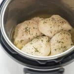 This is the BEST way to cook frozen chicken breasts in the Instant Pot! It is so easy and they turn out so well, I almost never take the time to thaw chicken before cooking it. Add seasonings, sauces, broth, or just water, salt and pepper and the result is always amazing. | pressure cooker | pressure cooking | healthy recipe | dinner | chicken dinner | #pressurecooker #instantpot #chicken #recipe