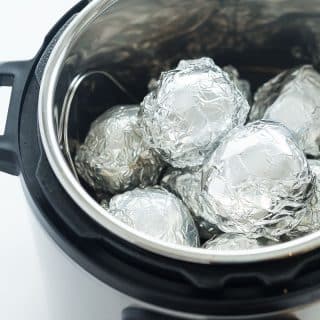 These Instant Pot Baked Potatoes are so easy, you'll never go back to the oven! Cook them with or without foil -- they're tender in just minutes and perfectly fluffy and creamy! | instant pot recipe | instant pot potatoes | #instantpot #instantpotrecipes