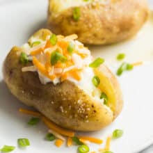 instant pot baked potatoes on white plate