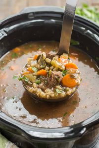 This Slow Cooker Beef Barley Soup is an easy crockpot meal perfect for fall or winter! Loaded with vegetables and tender chunks of beef. Includes step by step recipe video. | slow cooker recipe | crockpot recipe | beef stew | healthy dinner recipe | low calorie | high protein | #slowcooker #crockpot #slowcookerrecipe