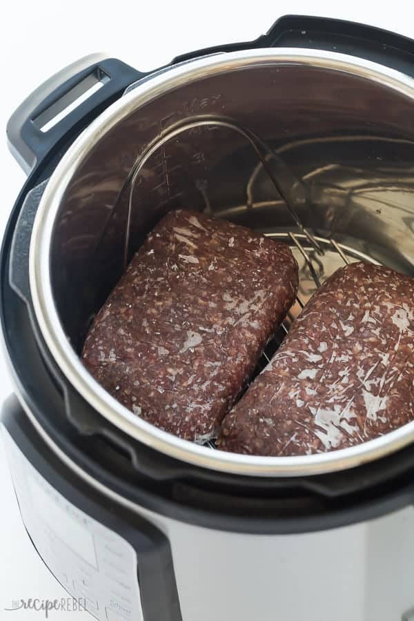frozen chunks of ground beef in instant pot on trivet