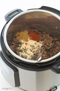 This Instant Pot Taco Meat from Frozen Ground Beef is the easiest way to do weeknight dinner! No thawing the meat, no extra pots -- just throw it in the Instant Pot or pressure cooker, cook and season! This taco filling is perfect for tacos, burritos, quesadillas, or taco salad and great for prepping ahead! #instantpot #pressurecooker #instantpotrecipe #recipe #groundbeef #tacos pressure cooker recipe