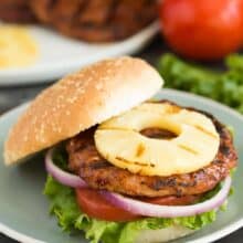 Hawaiian Chicken Burgers with Grilled Pineapple are an easy, healthy dinner recipe that's perfect for summer! Made with just a few simple ingredients and easy to make ahead or meal prep. Loaded with sweet and savoury flavours! Includes step by step recipe video.