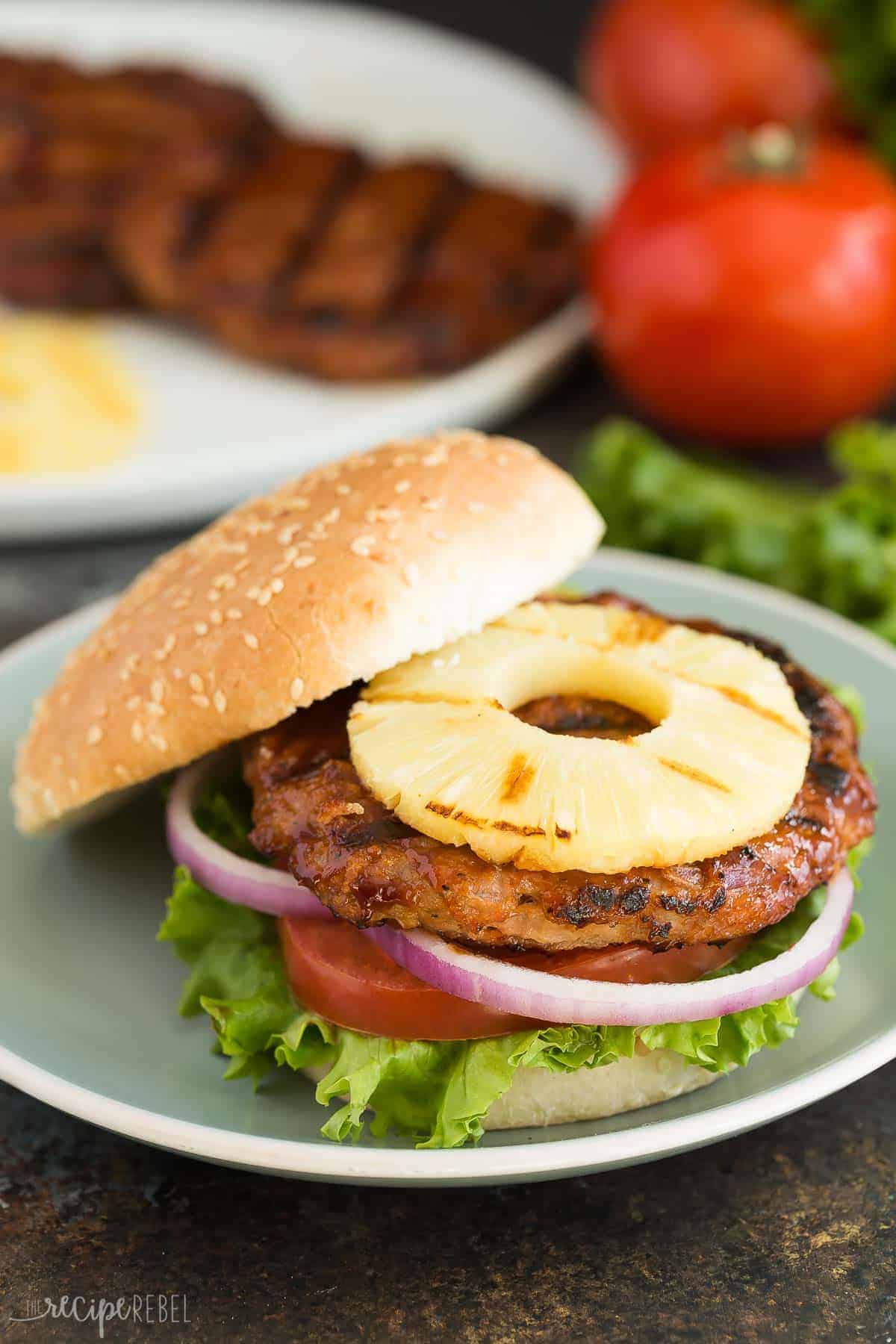 Hawaiian Chicken Burgers with Grilled Pineapple are an easy, healthy dinner recipe that's perfect for summer! Made with just a few simple ingredients and easy to make ahead or meal prep. Loaded with sweet and savoury flavours! Includes step by step recipe video.