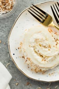This Pineapple Lush Angel Food Cake Roll is a new twist on the popular Angel Lush recipe! It's a fun dessert for Easter or Spring that's big on flavour and not too heavy. The perfect way to end a big holiday dinner! Includes step by step recipe video. | dessert | easy | easter | spring | coconut | cake mix | #dessert #cake #pineapple #easter