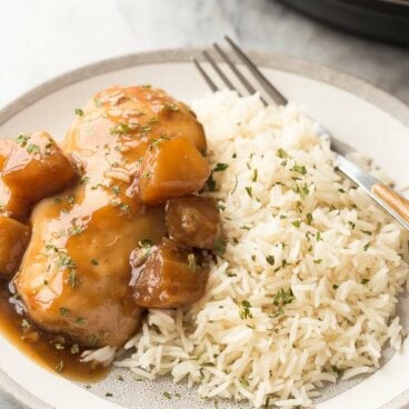 This Instant Pot Pineapple Chicken Recipe is an easy chicken dinner recipe that you can set and forget in your pressure cooker! Serve the chicken and sweet, tangy sauce over rice or noodles for the perfect weeknight dinner! Includes step by step recipe video. #pressurecooker pressure cooker #instantpotchicken #chickenrecipe #chickenrecipes #dinner #recipe #food #chicken