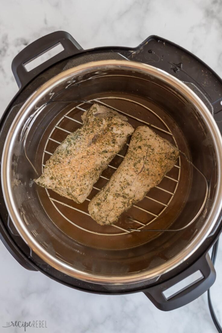 cooked pork tenderloin on trivet in instant pot