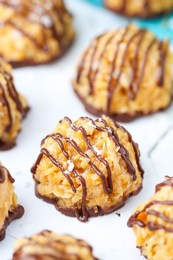 no bake salted caramel coconut macaroons with chocolate drizzle and flakes of salt