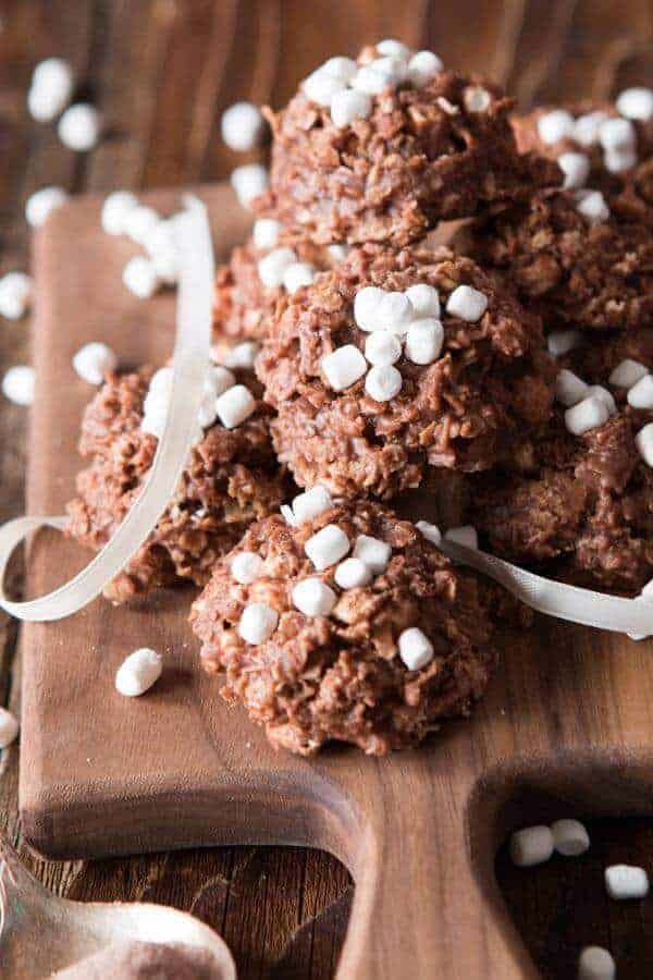 hot cocoa cookies stacked with mini marshmallow bits on top