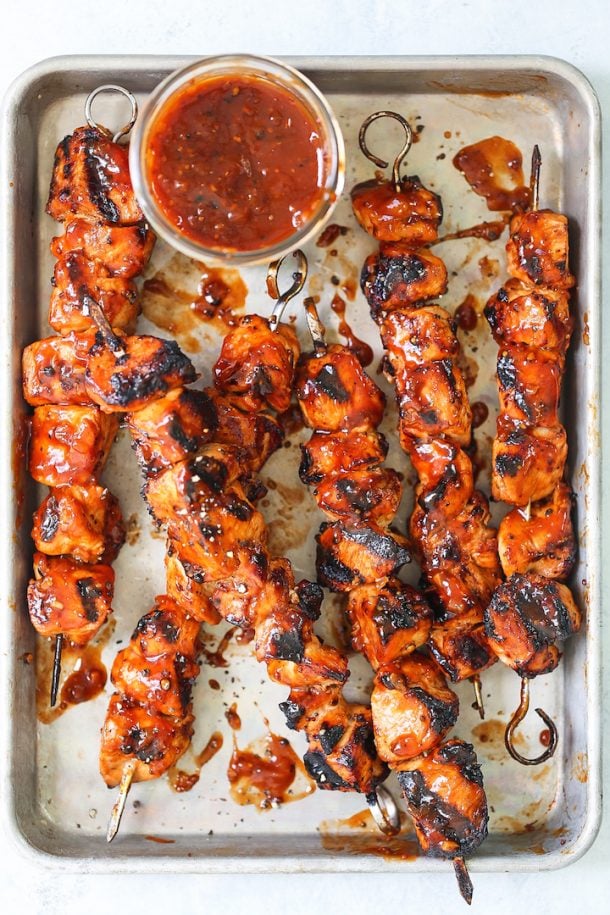 honey bbq chicken kabobs overhead image on a rimmed sheet pan