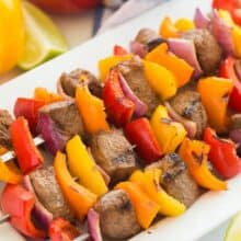 steak kabobs with peppers on a plate