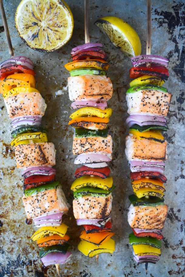 rainbow salmon skewers with grilled lemon wedges