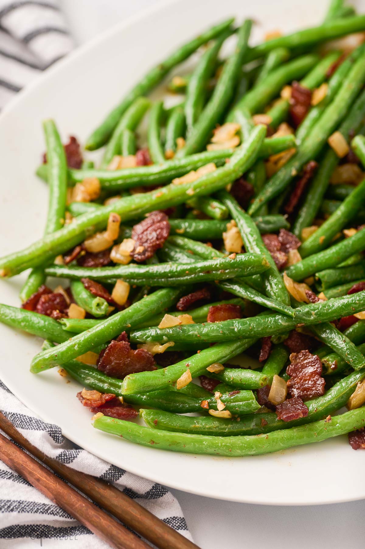 close up image of green beans with bacon