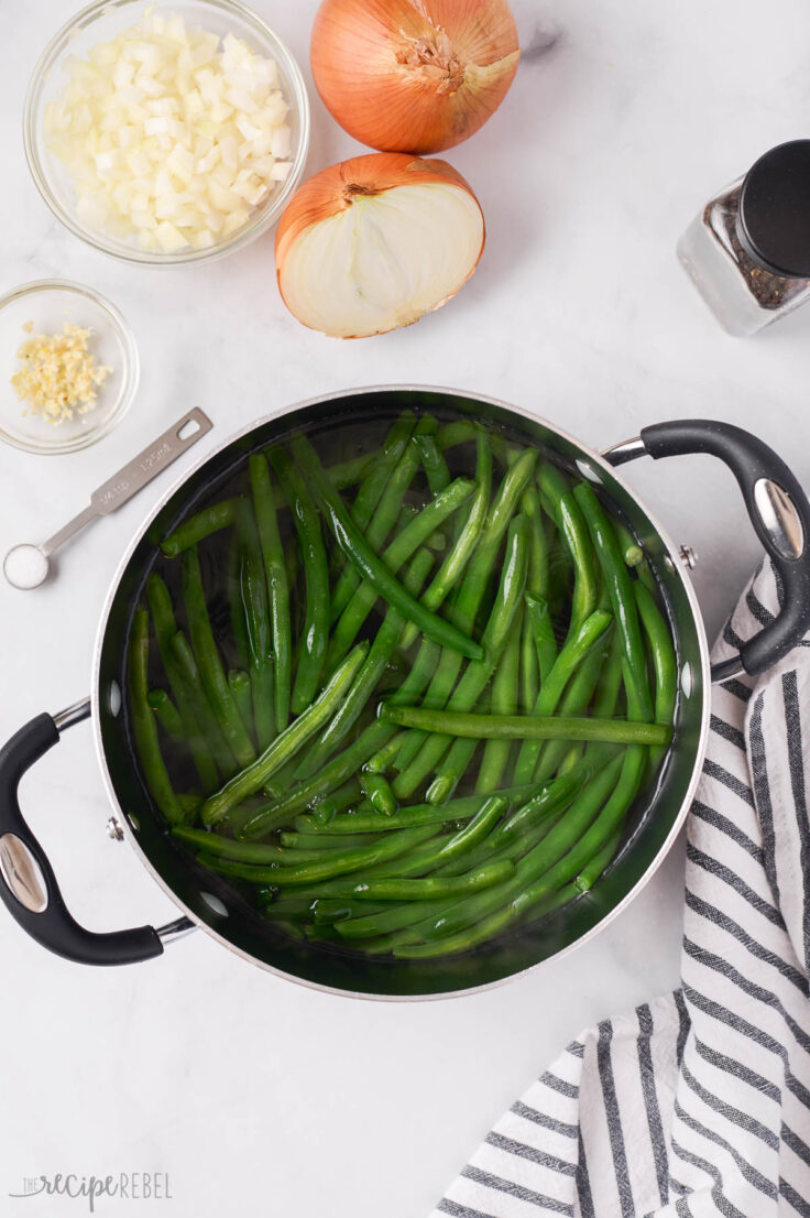 green beans being boiled in large pot