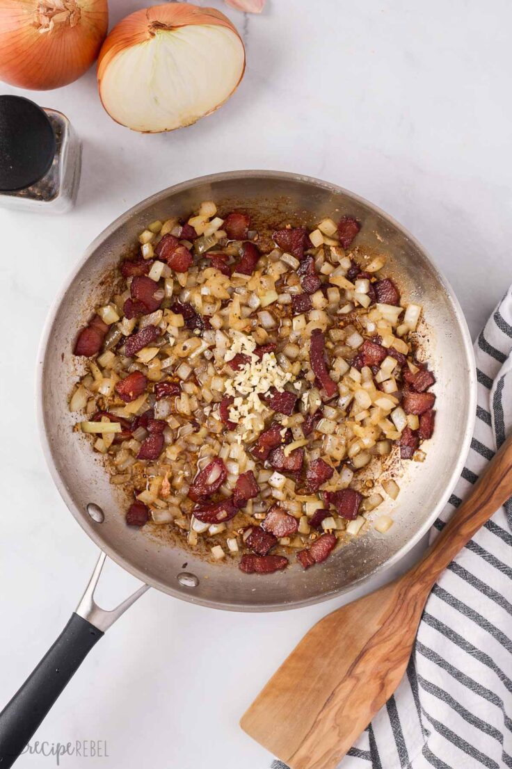 bacon and onions cooked in skillet