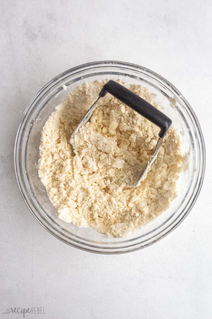 crust mixture in glass bowl ready for pan