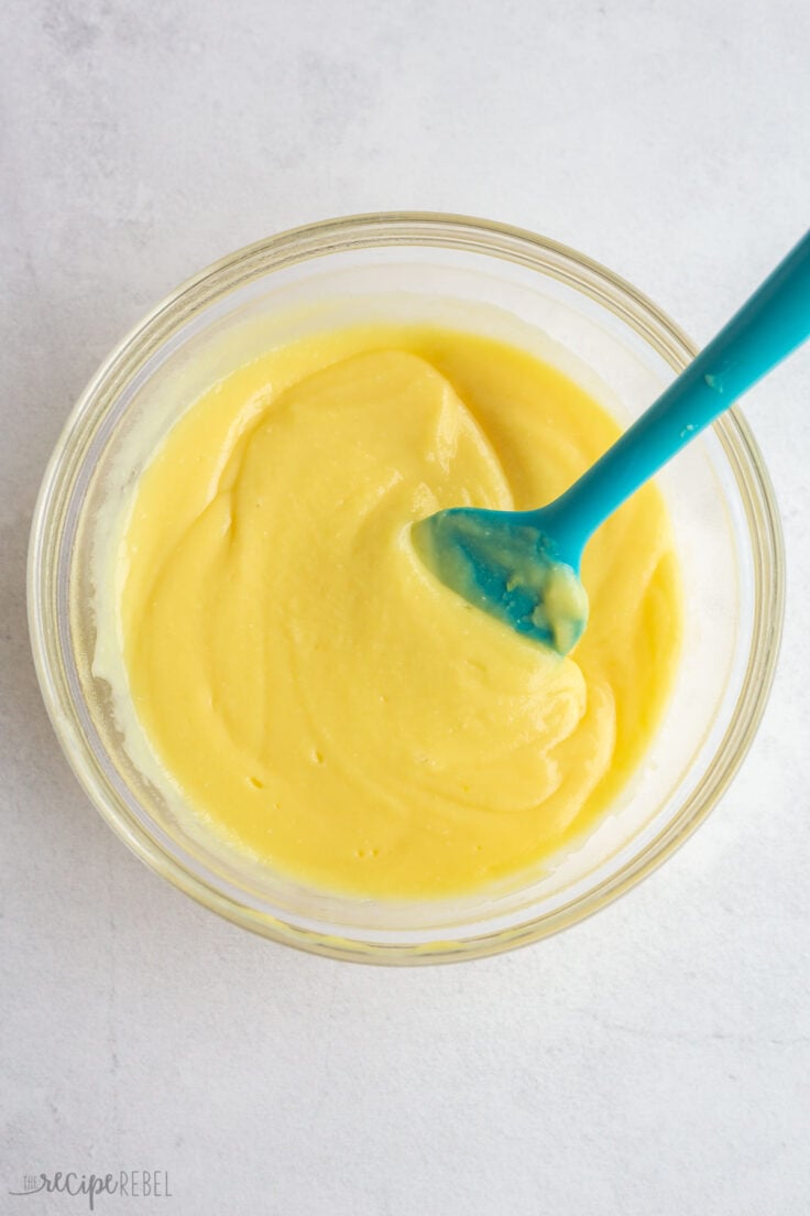 homemade lemon pudding strained and in a glass bowl