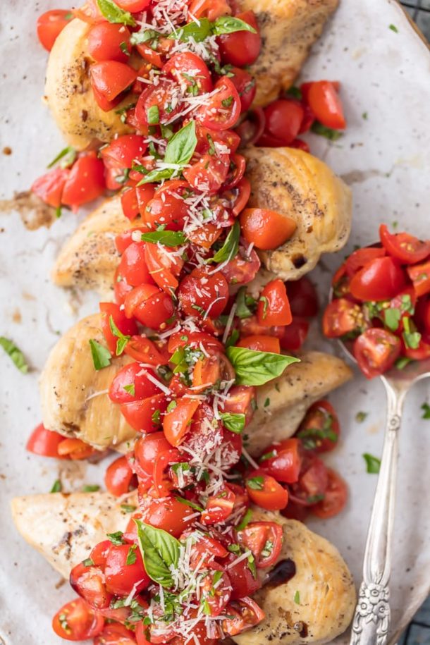 instant pot chicken bruschetta with fresh chopped tomatoes parmesan and basil on top