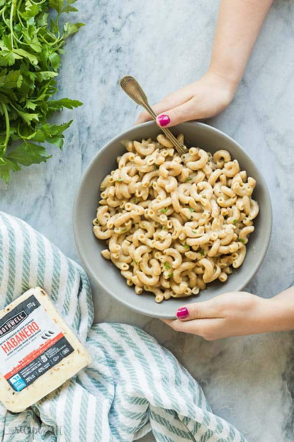 instant pot macaroni and cheese in a bowl with bothwell habanero cheese