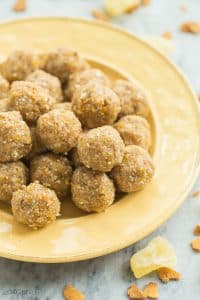 This Tropical No Bake Energy Bites recipe is perfect for back to school! Loaded with dried pineapple, mango, toasted coconut, oats, honey and coconut oil, it's a healthy snack to keep you (and the kids!) going all day long. They're freezer friendly and easy to make ahead. Includes step by step recipe video.