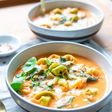 creamy tomato tortellini soup in bowl