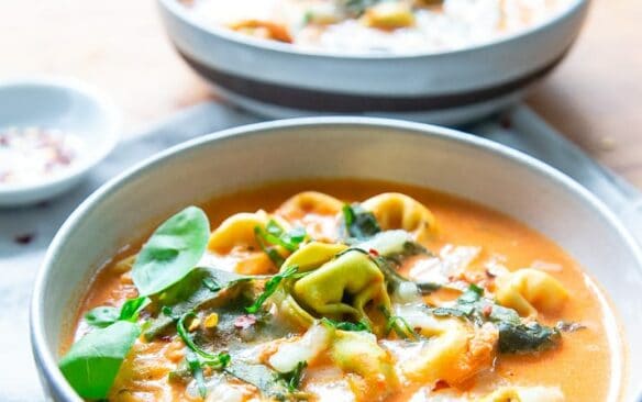 creamy tomato tortellini soup in bowl