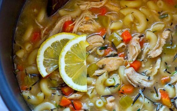 instant pot lemon rosemary chicken noodle soup with lemon slices