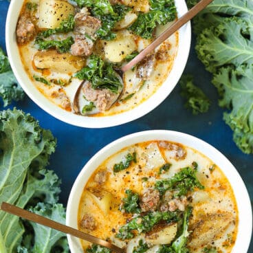 two bowls of instant pot zuppa toscana soup