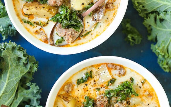 two bowls of instant pot zuppa toscana soup