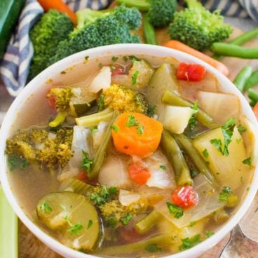 instant pot weight loss soup with veggies in the background
