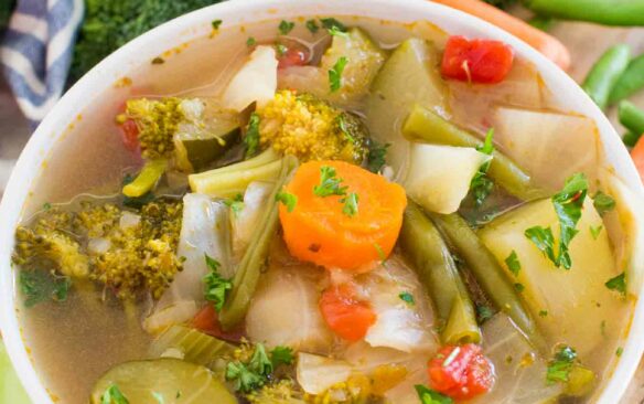 instant pot weight loss soup with veggies in the background