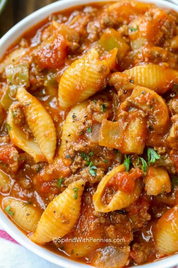 ground beef crock pot goulash very close up with shells pasta