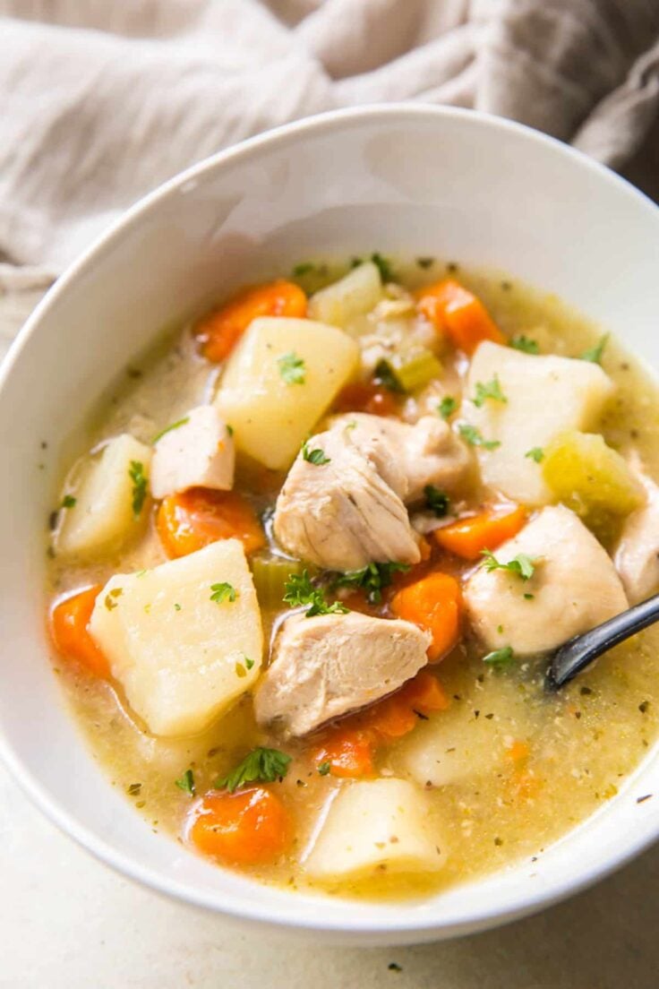 close up image of instant pot chicken stew in bowl
