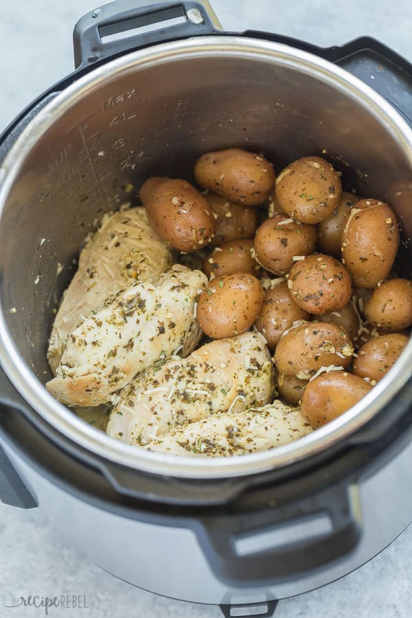 instant pot chicken and potatoes in pressure cooker with herbs and garlic