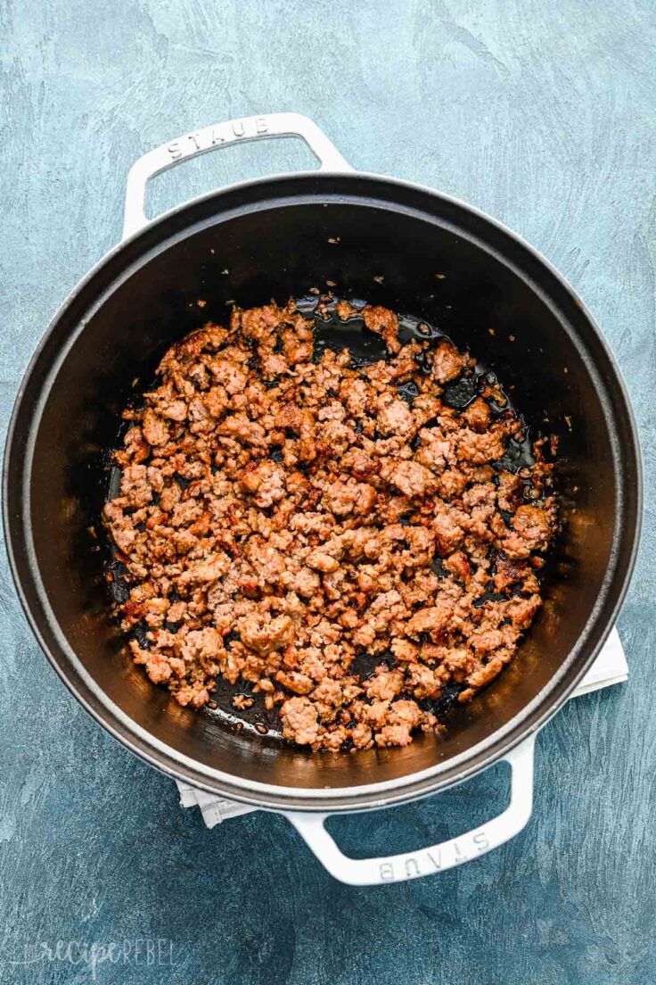 cooked ground italian sausage in soup pot.