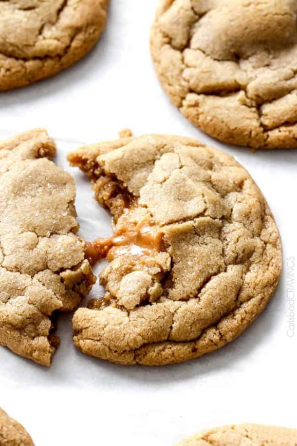 caramel stuffed brown sugar cookies up close on white background