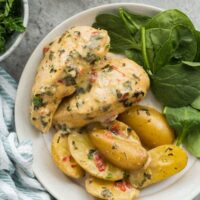 italian crockpot chicken and potatoes on plate